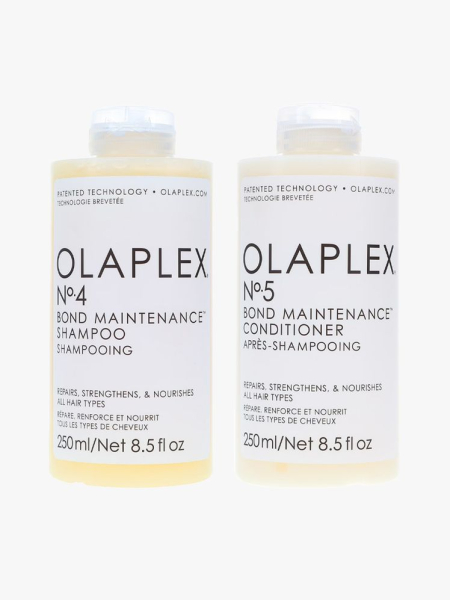 Olaplex Bond Maintenance No. 4 Shampoo & No. 5 Conditioner in branded components on a light gray background